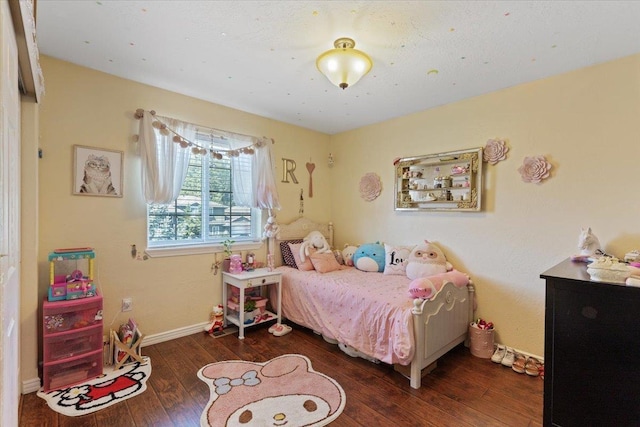 5808 N Hermosa Cir, Otis Orchards, WA 99027 - bedroom with hardwood / wood-style floors and baseboards