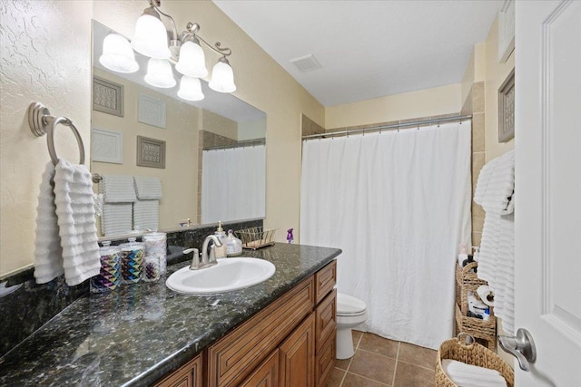 5808 N Hermosa Cir, Otis Orchards, WA 99027 - bathroom featuring vanity, tile patterned flooring, a chandelier, and curtained shower