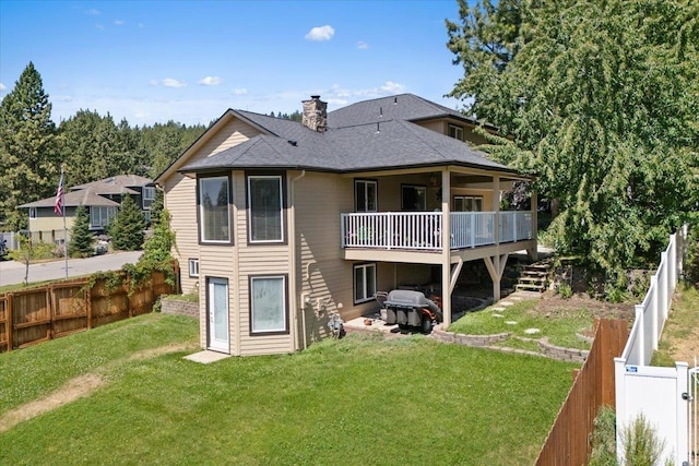5808 N Hermosa Cir, Otis Orchards, WA 99027 - back of house with a chimney, a wooden deck, a fenced backyard, and roof with shingles