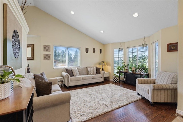 5808 N Hermosa Cir, Otis Orchards, WA 99027 - living room featuring healthy amount of natural light, dark wood-style flooring, recessed lighting, and high vaulted ceiling