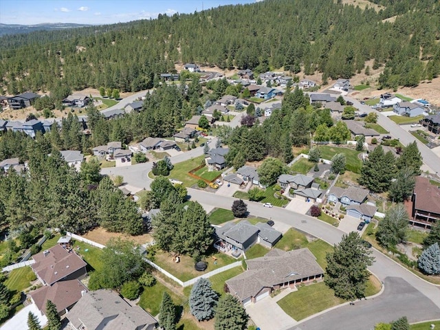 5808 N Hermosa Cir, Otis Orchards, WA 99027 - aerial view of property and surrounding area with a heavily wooded area and nearby suburban area