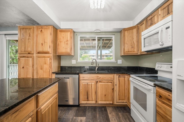 415 E Shiloh Hills Dr, Spokane, WA 99208 - kitchen with white appliances, dark wood-type flooring, plenty of natural light, and dark stone countertops