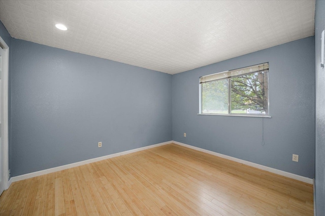 415 E Shiloh Hills Dr, Spokane, WA 99208 - unfurnished room featuring light wood finished floors and recessed lighting