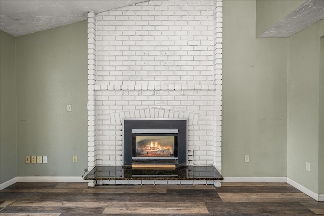 415 E Shiloh Hills Dr, Spokane, WA 99208 - detailed view of wood finished floors and a brick fireplace