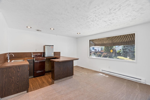 5504 N Post St, Spokane, WA 99205 - office area featuring baseboard heating, a textured ceiling, recessed lighting, wood finished floors, and carpet floors