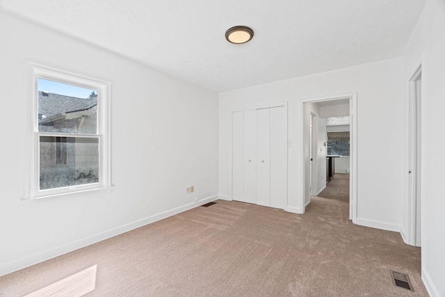 5504 N Post St, Spokane, WA 99205 - unfurnished bedroom with carpet floors and a closet