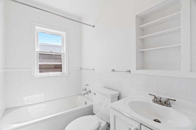 5504 N Post St, Spokane, WA 99205 - full bath featuring a bathtub, tile walls, vanity, and wainscoting
