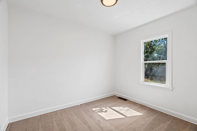 5504 N Post St, Spokane, WA 99205 - carpeted empty room featuring baseboards