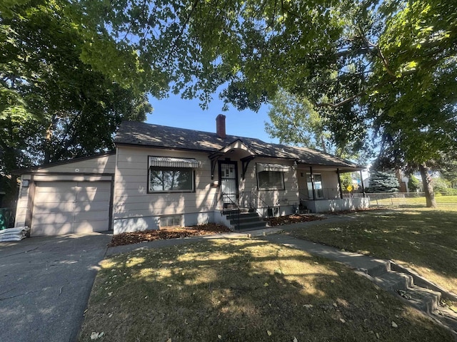 5504 N Post St, Spokane, WA 99205 - bungalow featuring concrete driveway, an attached garage, and a chimney