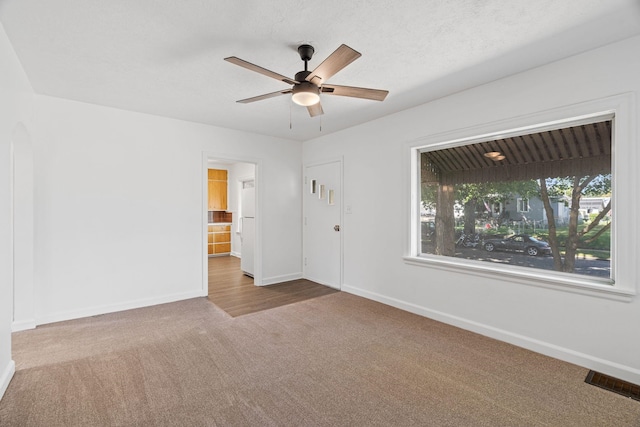 5504 N Post St, Spokane, WA 99205 - spare room with carpet floors and ceiling fan