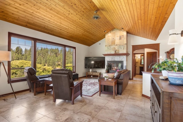 7814 S Ellis Rd, Spokane, WA 99223 - living area featuring high vaulted ceiling, wood ceiling, and a premium fireplace