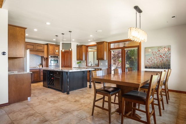 7814 S Ellis Rd, Spokane, WA 99223 - dining area featuring recessed lighting and a chandelier