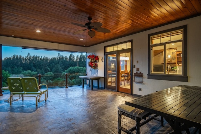 7814 S Ellis Rd, Spokane, WA 99223 - sunroom with a forest view