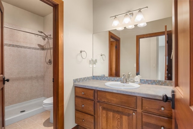 7814 S Ellis Rd, Spokane, WA 99223 - full bath featuring a stall shower, vanity, and tile patterned flooring
