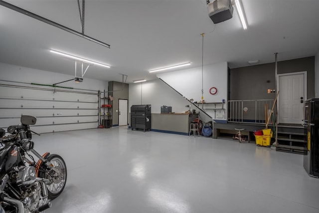 7814 S Ellis Rd, Spokane, WA 99223 - garage featuring a garage door opener