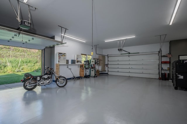 7814 S Ellis Rd, Spokane, WA 99223 - garage featuring a garage door opener