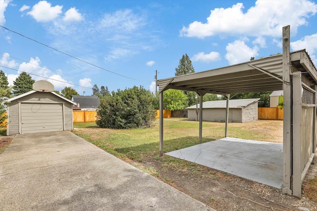 7102 E Bridgeport Ave, Spokane Valley, WA 99212 - view of yard featuring an outdoor structure and a garage
