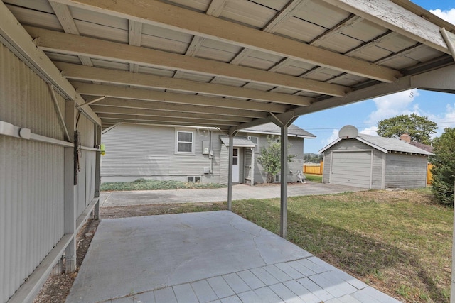 7102 E Bridgeport Ave, Spokane Valley, WA 99212 - view of patio with a storage unit