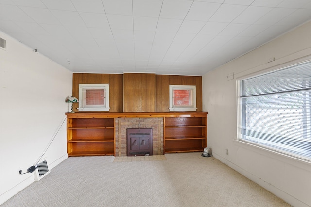 7102 E Bridgeport Ave, Spokane Valley, WA 99212 - living area with light colored carpet and wood walls
