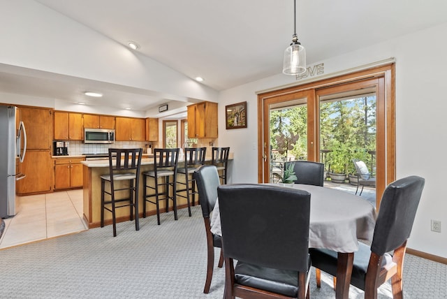 5321 Pinebrook Ct, Spokane, WA 99206 - dining area featuring vaulted ceiling, recessed lighting, and light colored carpet