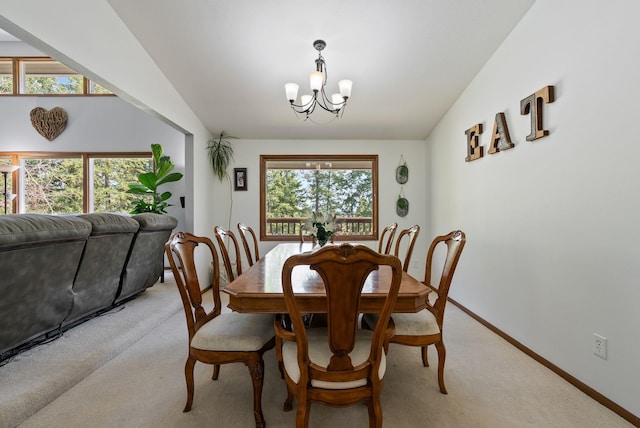 5321 Pinebrook Ct, Spokane, WA 99206 - dining space with a chandelier and light colored carpet