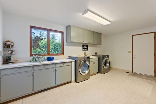 5321 Pinebrook Ct, Spokane, WA 99206 - laundry area featuring cabinet space and washer and dryer