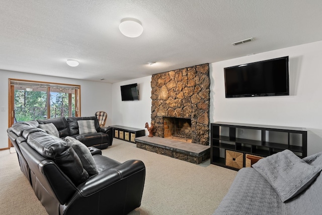 5321 Pinebrook Ct, Spokane, WA 99206 - carpeted living room with a textured ceiling and a stone fireplace