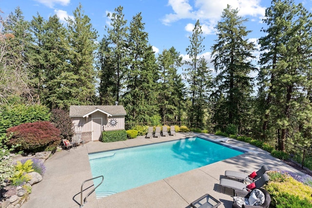 5321 Pinebrook Ct, Spokane, WA 99206 - outdoor pool featuring a patio area and an outbuilding