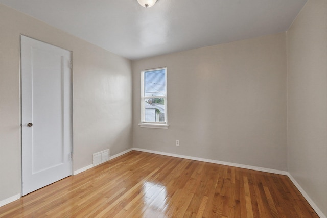 2509 W Upton Ave, Spokane, WA 99205 - empty room with light wood-style floors and baseboards