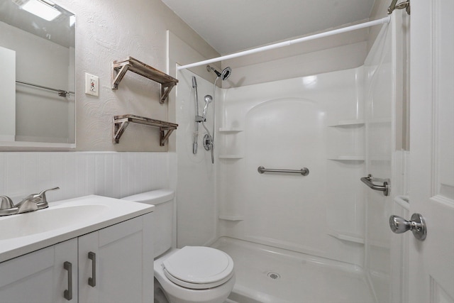 2509 W Upton Ave, Spokane, WA 99205 - bathroom featuring a shower, vanity, and wainscoting