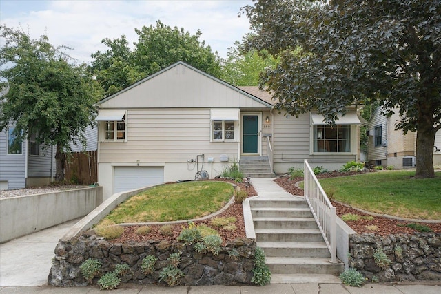1501 S Maple St, Spokane, WA 99203 - view of front of property featuring a garage, entry steps, and driveway