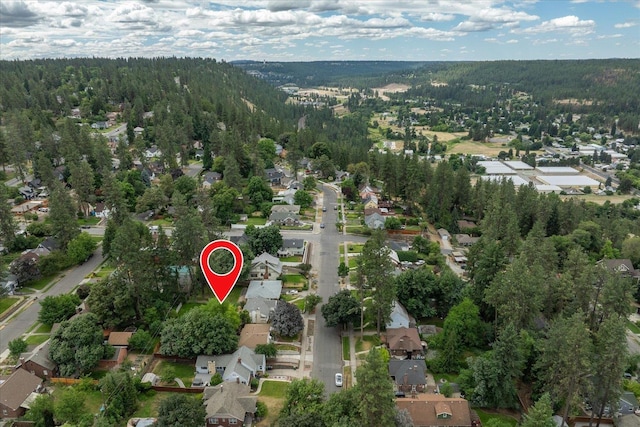 1501 S Maple St, Spokane, WA 99203 - aerial overview of property's location featuring nearby suburban area and a forest