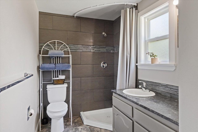 404 E Carriage Ct, Spokane, WA 99218 - bathroom featuring a stall shower and vanity