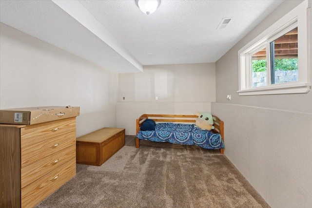404 E Carriage Ct, Spokane, WA 99218 - carpeted bedroom with a textured ceiling
