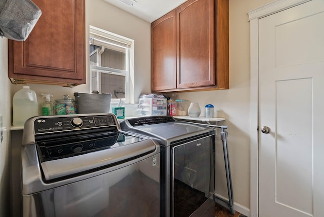 17309 E Baldwin Ave, Spokane Valley, WA 99016 - laundry room featuring cabinet space and washer and clothes dryer