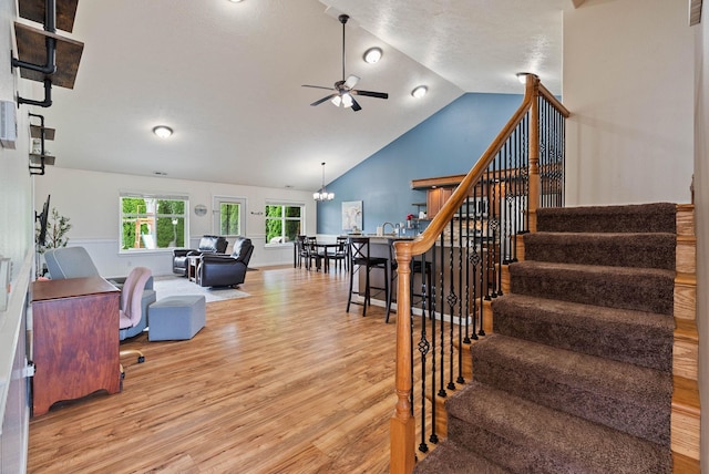 17309 E Baldwin Ave, Spokane Valley, WA 99016 - stairway with wood finished floors, ceiling fan, and vaulted ceiling