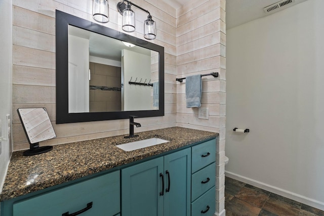 17309 E Baldwin Ave, Spokane Valley, WA 99016 - bathroom featuring vanity and stone finish floors