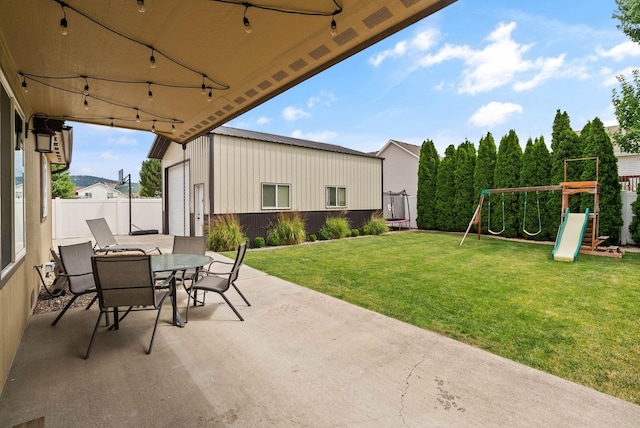 17309 E Baldwin Ave, Spokane Valley, WA 99016 - view of patio / terrace with a playground and outdoor dining area