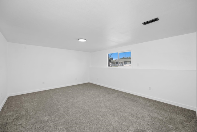 12024 E Buckeye Ave, Spokane Valley, WA 99206 - unfurnished room with dark carpet and baseboards
