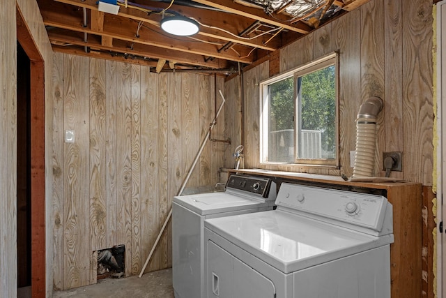 12024 E Buckeye Ave, Spokane Valley, WA 99206 - laundry room featuring washing machine and clothes dryer and wooden walls