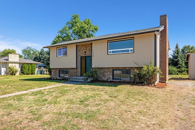 12024 E Buckeye Ave, Spokane Valley, WA 99206 - raised ranch with a front lawn and a chimney