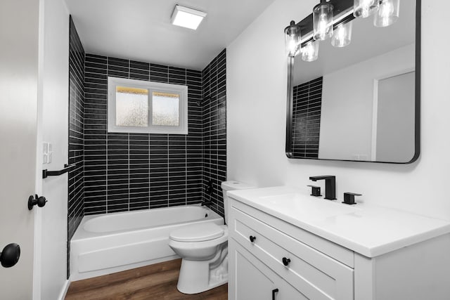 12024 E Buckeye Ave, Spokane Valley, WA 99206 - bathroom featuring vanity, wood finished floors, and shower / tub combination