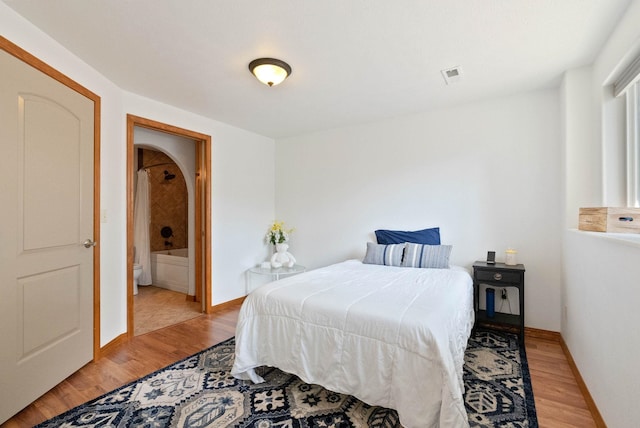 17110 E Daybreak Ln, Spokane Valley, WA 99016 - bedroom featuring light wood-style floors and ensuite bath