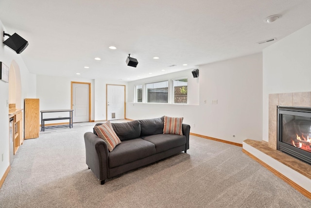 17110 E Daybreak Ln, Spokane Valley, WA 99016 - living area with light colored carpet, a tile fireplace, and recessed lighting