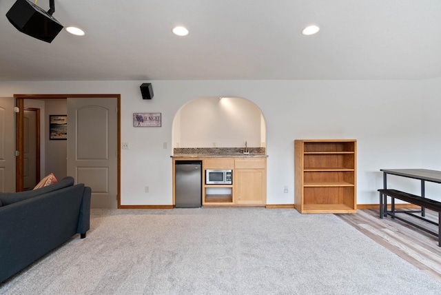 17110 E Daybreak Ln, Spokane Valley, WA 99016 - living area featuring wet bar, recessed lighting, and light colored carpet