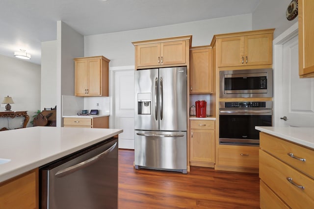 8510 N Jodi St, Spokane, WA 99208 - kitchen with stainless steel appliances, light brown cabinetry, dark wood-style flooring, light countertops, and backsplash