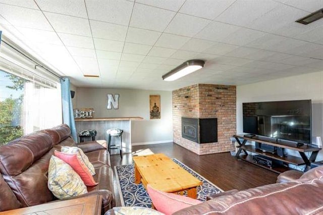 5801 N Drumheller St, Spokane, WA 99205 - living area with wood finished floors and a fireplace