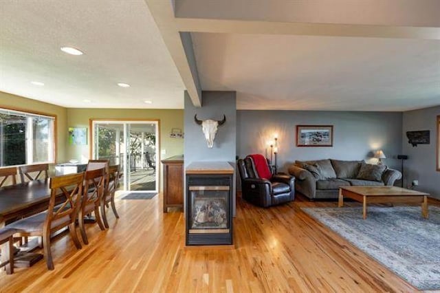 5801 N Drumheller St, Spokane, WA 99205 - living room with light wood-style floors, recessed lighting, and beamed ceiling