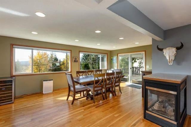 5801 N Drumheller St, Spokane, WA 99205 - dining space featuring recessed lighting, light wood finished floors, and beverage cooler