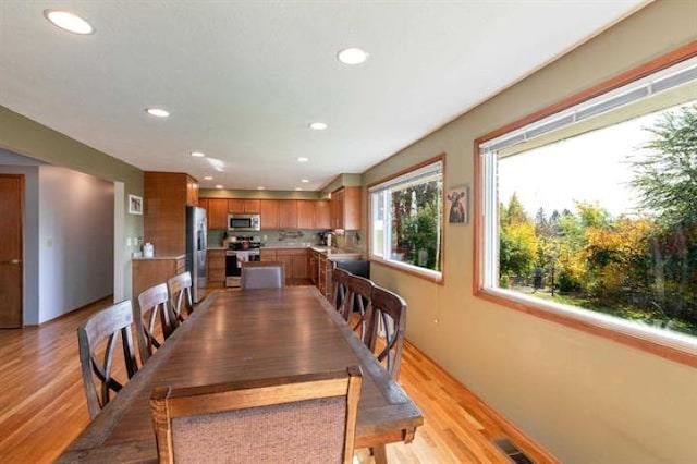 5801 N Drumheller St, Spokane, WA 99205 - dining space featuring light wood-style floors and recessed lighting